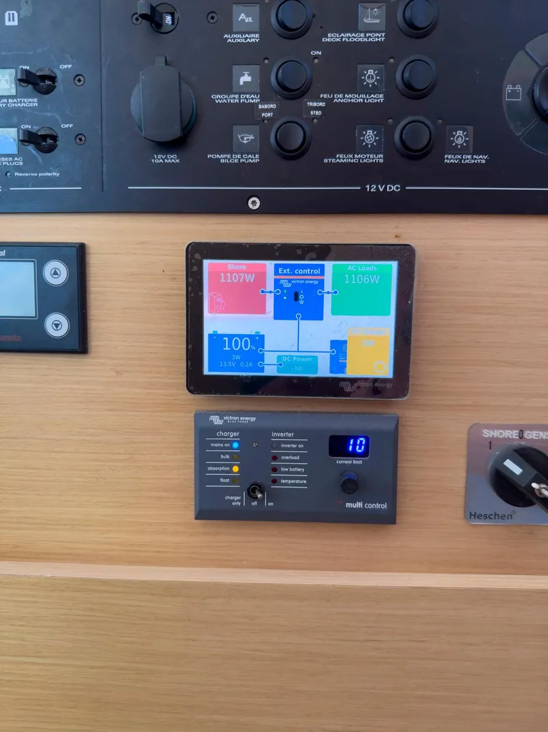 Slide: The Image of Bilge compartment of a 2017 Lagoon 42 catamaran with visible hoses and fittings. - 42