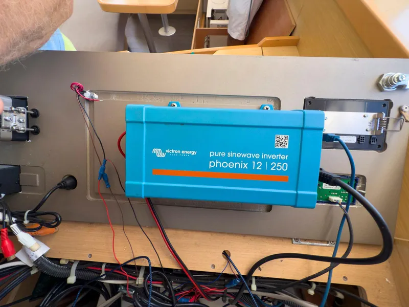 Slide: The Image of 2017 Lagoon 42 catamaran docked, showcasing spacious deck and modern design. - 47