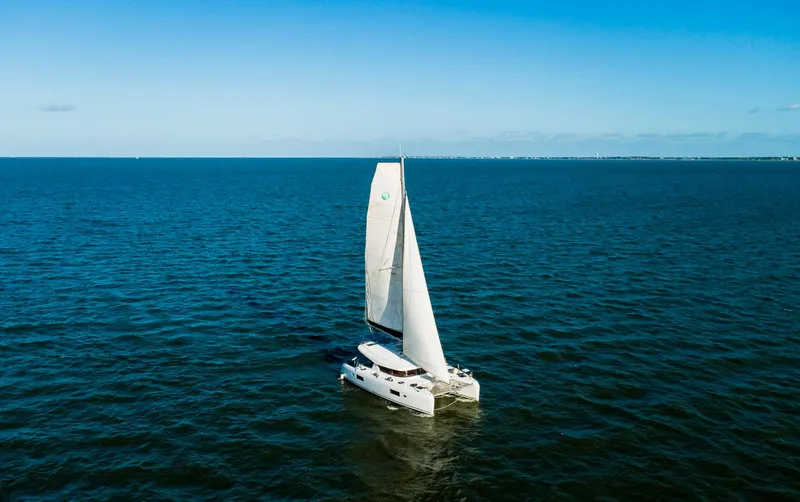 Slide: The Image of Close-up of a 2017 Lagoon 42 sailboat's rope cleat mechanism on deck. - 5