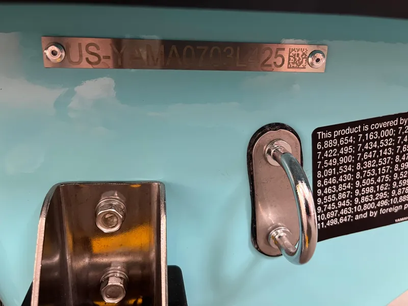 Slide: The Image of 2025 Yamaha WaveRunner JetBlaster PRO 3-Up hull identification and patent information plate. - 10