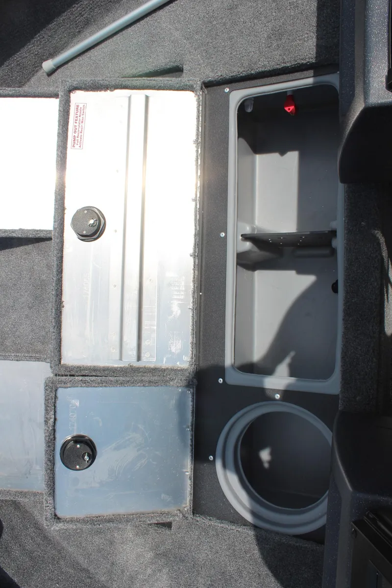 Slide: The Image of 2026 Tracker Pro Guide V-16 WT boat storage compartments and features. - 16