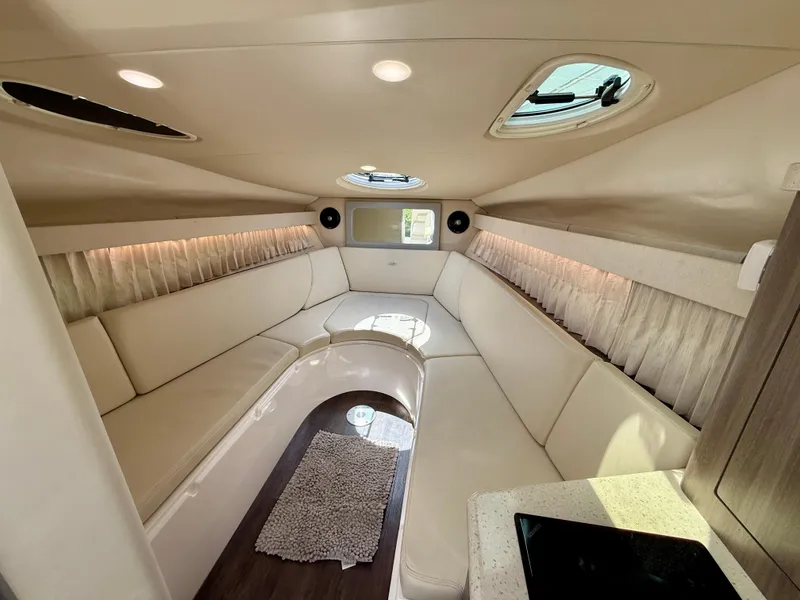 Slide: The Image of Luxurious interior of 2019 Regal 28 Express boat with plush seating and modern design. - 28