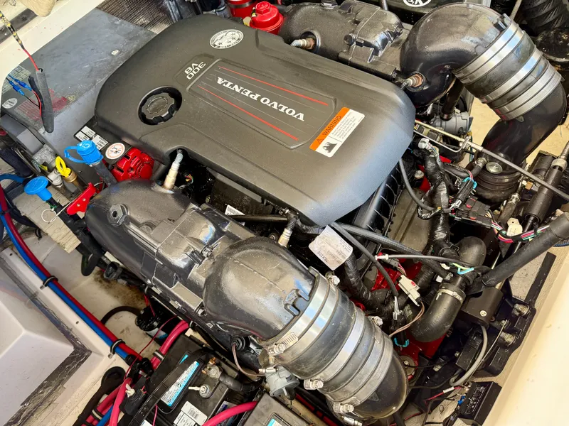 Slide: The Image of Engine compartment of a 2019 Regal 28 Express with Volvo Penta V8 engine. - 39