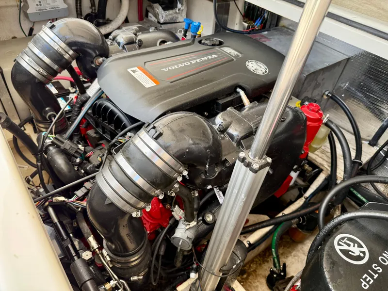 Slide: The Image of Engine compartment of a 2019 Regal 28 Express boat with Volvo Penta engine. - 40