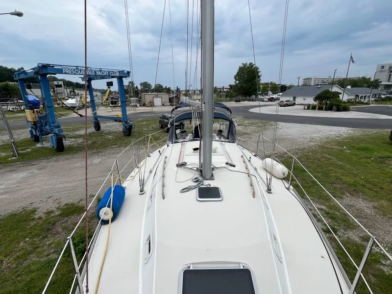 Slide: The Image of Pearson 33-2 sailboat from 1986 at Presque Isle Yacht Club, docked on land. - 33