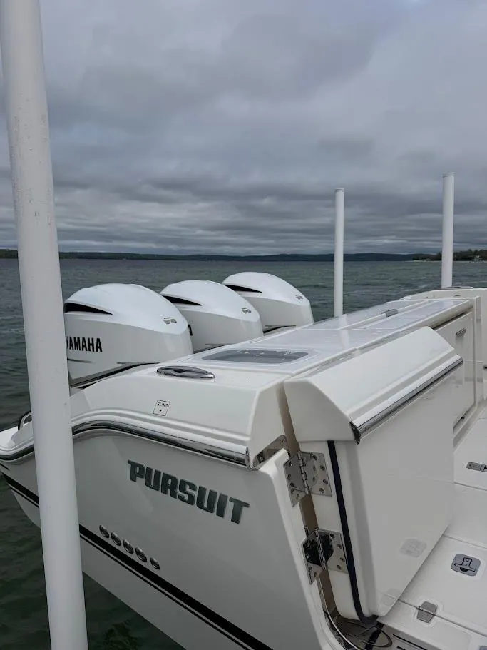 Slide: The Image of 2020 Pursuit S 368 Sport boat with Yamaha engines on a cloudy day. - 37