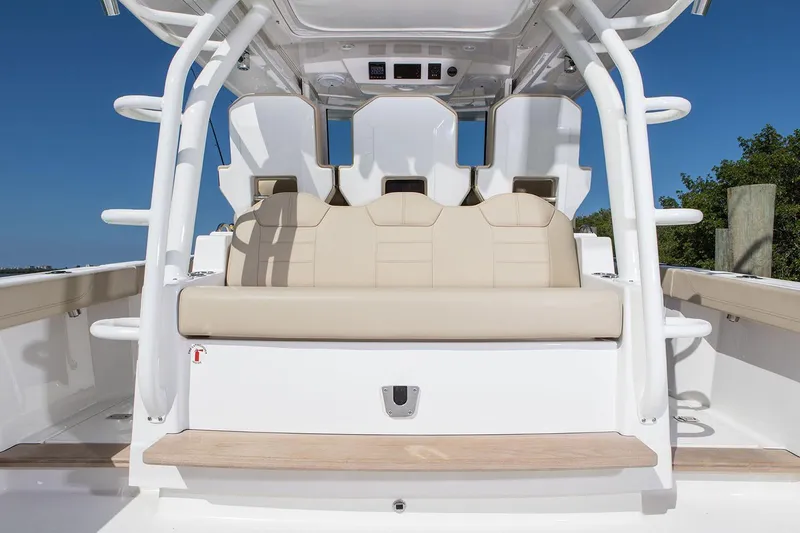 Slide: The Image of Manufacturer Provided Image: 2020 Pursuit S 368 Sport boat with beige seating and white frame. - 8