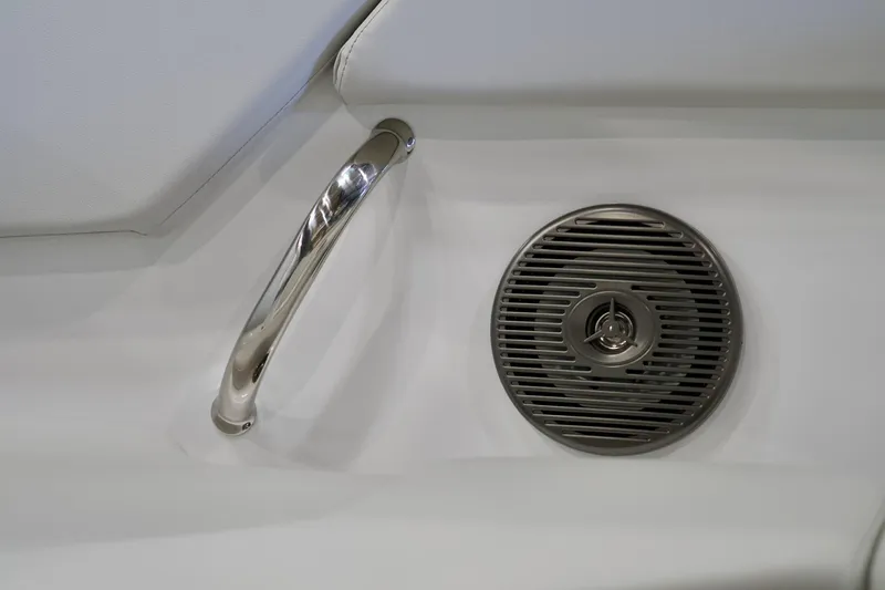Slide: The Image of 2026 Four Winns H2 boat interior with metal handle and speaker detail. - 20
