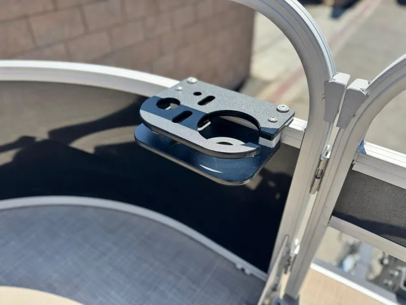 Slide: The Image of 2019 Sun Tracker Fishin' Barge 20 DLX cup holder detail on boat railing. - 10