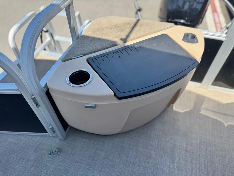 Slide: The Image of 2019 Sun Tracker Fishin' Barge 20 DLX, fishing station with cup holder and measuring board. - 15