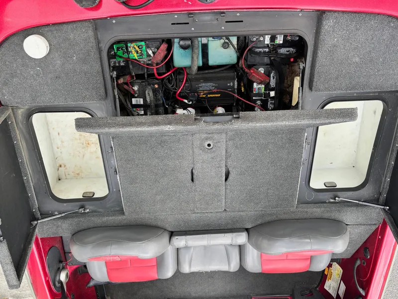 Slide: The Image of 2007 Skeeter ZX 200 boat interior showing battery compartment and seating area. - 10