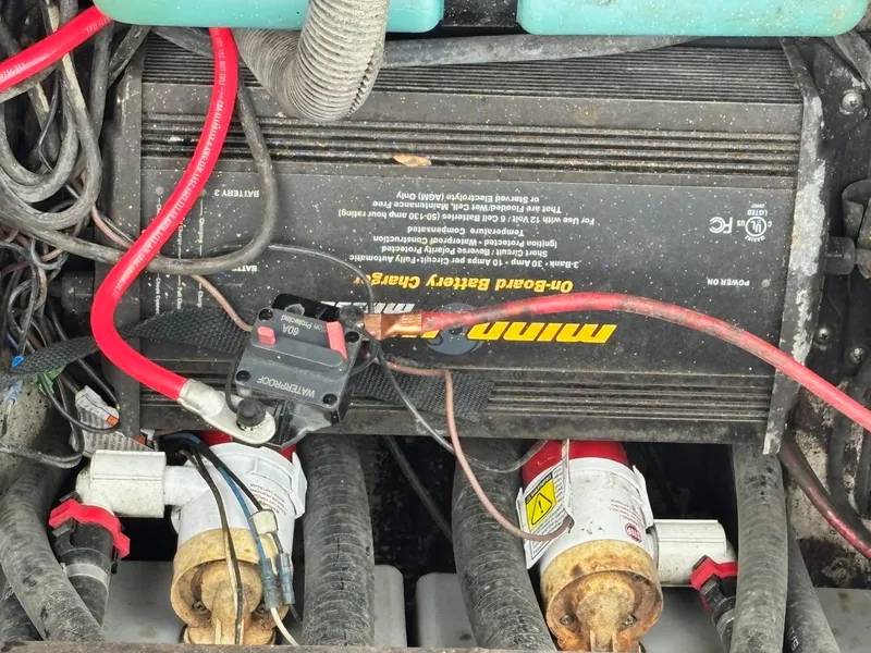 Slide: The Image of 2007 Skeeter ZX 200 boat battery charger and wiring setup. - 9