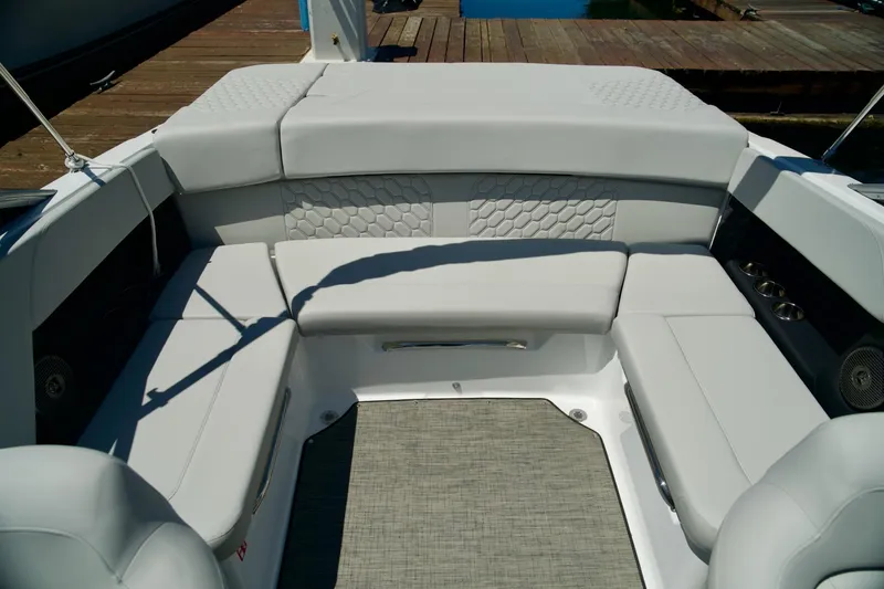 Slide: The Image of 2026 Four Winns H4 boat interior with luxurious seating and modern design. - 21