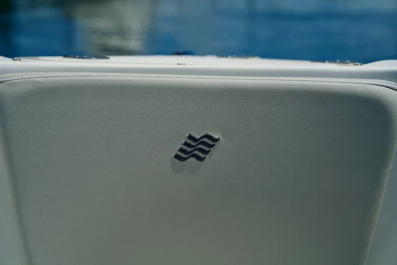 Slide: The Image of 2026 Four Winns H4 boat seat with embroidered wave logo. - 22