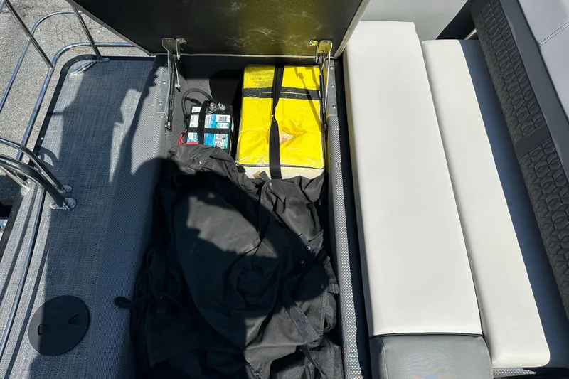 Slide: The Image of Storage compartment of 2022 Godfrey SWEETWATER 2286 SFL with battery and equipment. - 15