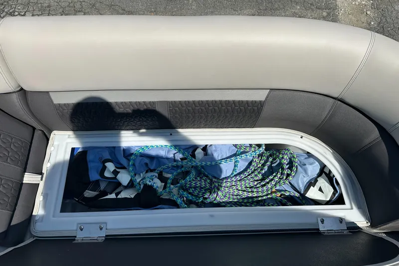 Slide: The Image of Storage compartment in 2022 Godfrey SWEETWATER 2286 SFL boat with ropes and gear. - 16