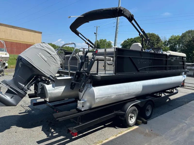 Slide: The Image of 2022 Godfrey SWEETWATER 2286 SFL pontoon boat with Yamaha engine on trailer. - 4