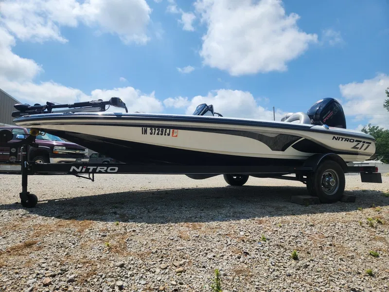 Slide: The Image of 2022 Nitro Z17 boat on trailer under blue sky. - 3