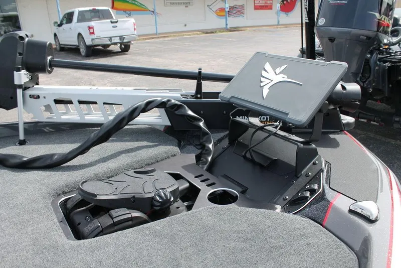 Slide: The Image of 2026 Skeeter FXR 21 FLEX boat dashboard with advanced navigation system and trolling motor. - 7