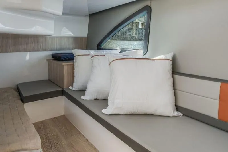 Slide: The Image of Interior of 2025 Hanover 377 Outboard boat with cushions and modern design. - 16