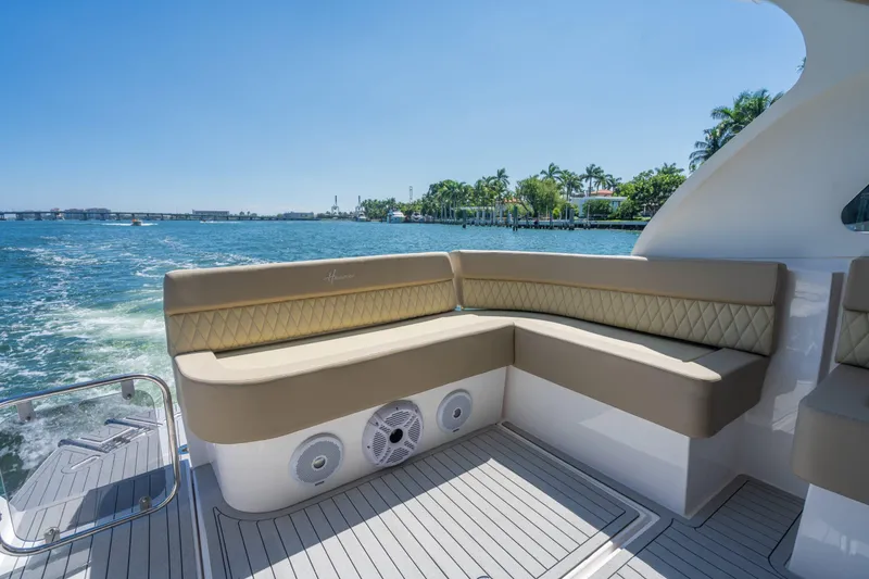 Slide: The Image of Luxurious seating on 2025 Hanover 375 Outboard boat with scenic water view. - 10