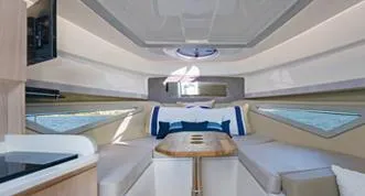 Slide: The Image of Luxurious interior of 2025 Hanover 375 Inboard boat with modern seating and elegant design. - 15