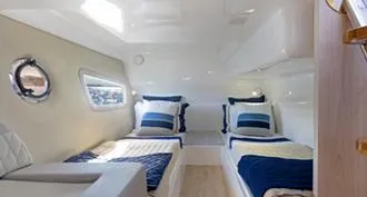 Slide: The Image of Interior of 2025 Hanover 375 Inboard boat with twin beds and modern design. - 17
