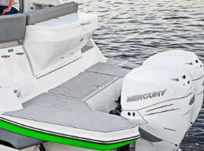 Slide: The Image of 2025 Hanover 375 Outboard boat with dual Mercury engines on water. - 4