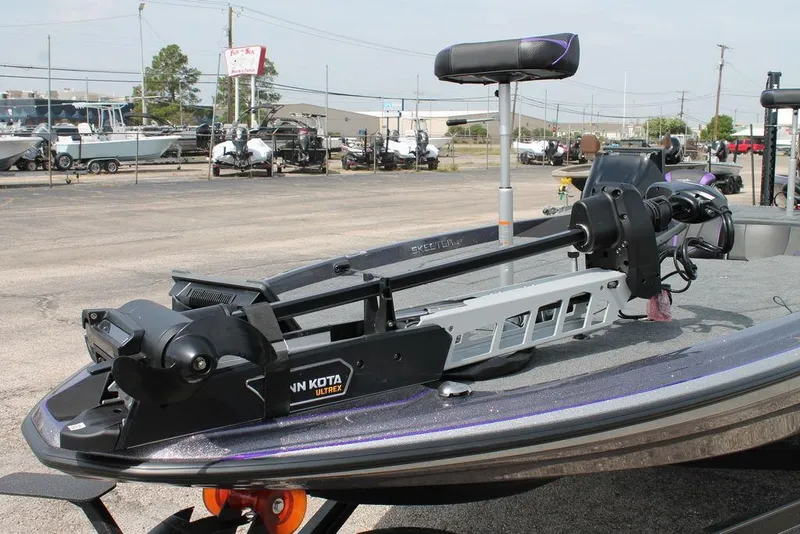 Slide: The Image of 2026 Skeeter ZXE21 boat with Minn Kota Ultrex trolling motor in a dealership lot. - 5