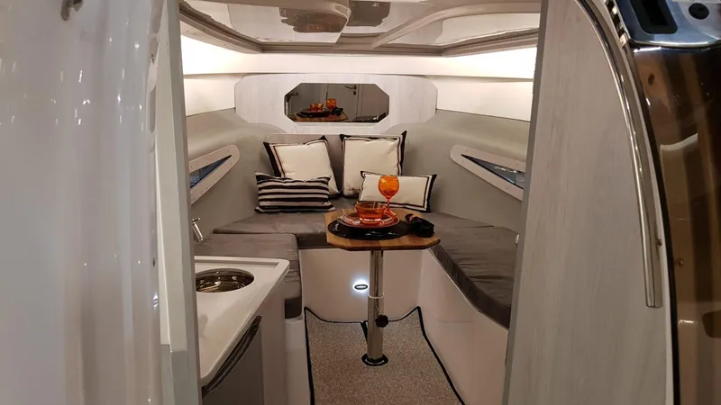 Slide: The Image of Luxurious interior of 2025 Hanover 355 Outboard boat with cozy seating and elegant decor. - 16