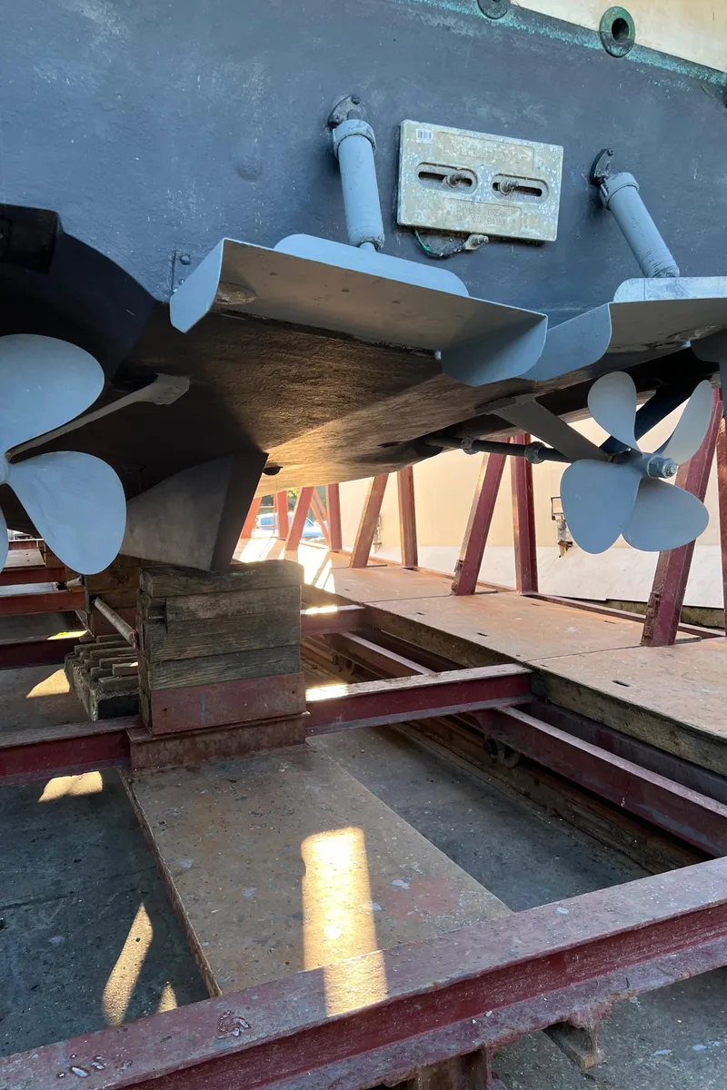 Slide: The Image of 1988 Bayliner 4588 yacht propellers and hull on dry dock. - 42