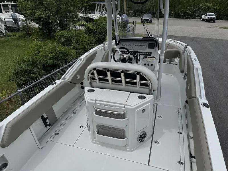 Slide: The Image of 2024 Finseeker 230 CC boat interior with modern console and seating. - 3