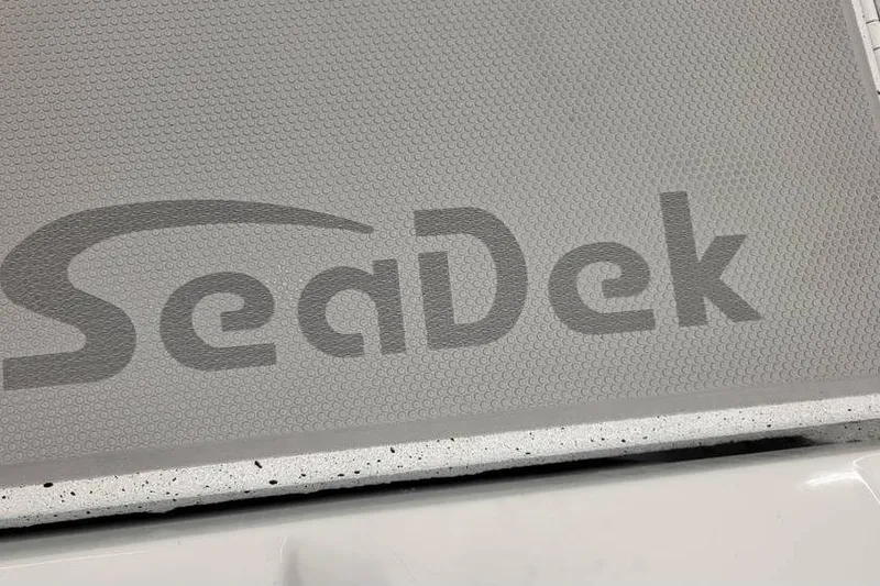 Slide: The Image of Gray SeaDek flooring on 2025 Xpress H20C Crappie boat, featuring textured surface. - 31