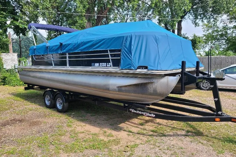 Slide: The Image of 2013 Starcraft Limited 236 Starlounger pontoon boat on trailer, covered with blue tarp. - 7