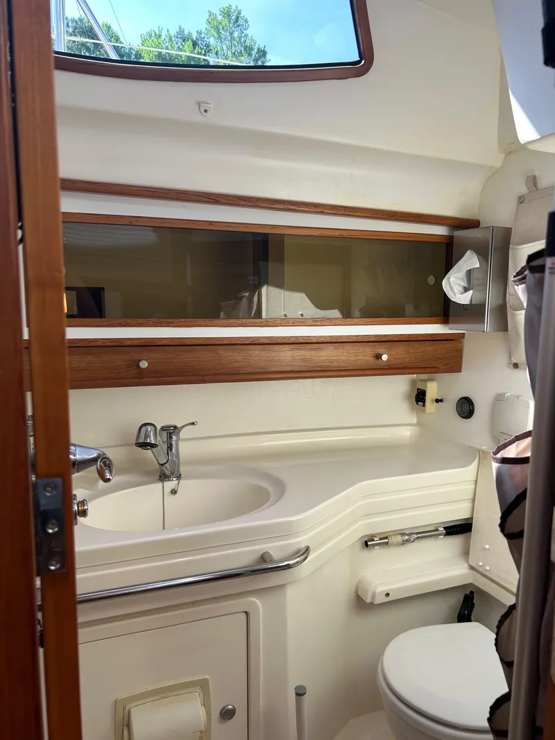 Slide: The Image of Interior of 2006 Southerly 115 Mk IV yacht bathroom with sink and toilet. - 16