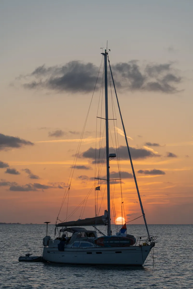 Slide: The Image of Sailboat Southerly 115 Mk IV at sunset, 2006 model, on calm sea. - 2