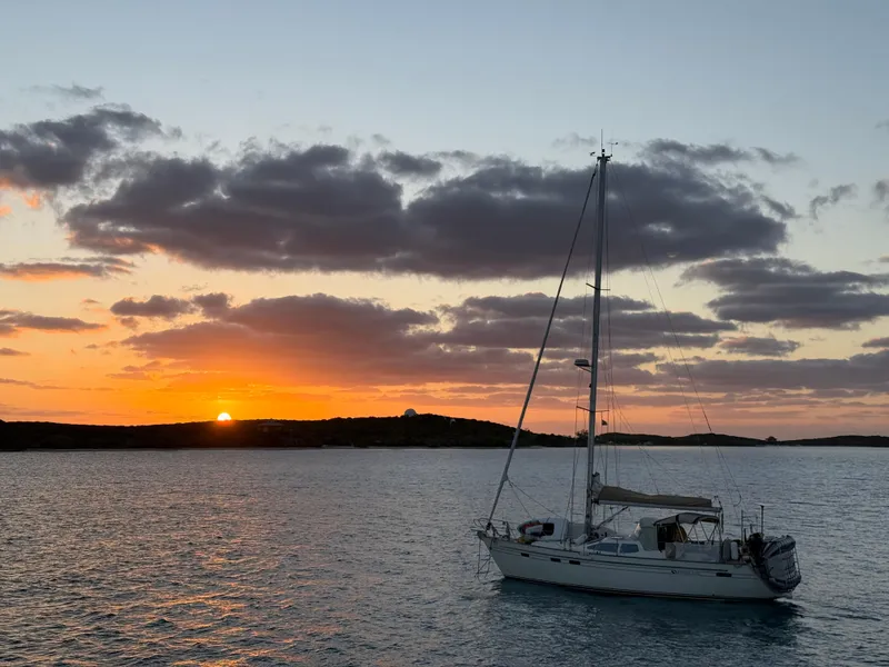 Slide: The Image of Sailboat Southerly 115 Mk IV (2006) at sunset on calm waters. - 3