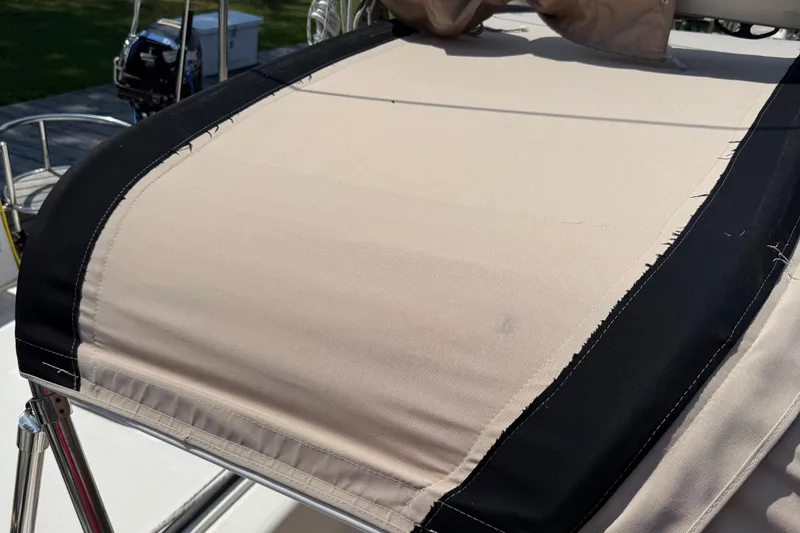 Slide: The Image of Beige and black canvas cover on a 2006 Southerly 115 Mk IV sailboat. - 31