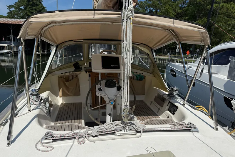 Slide: The Image of Cockpit of 2006 Southerly 115 Mk IV sailboat with steering wheel and canopy. - 38