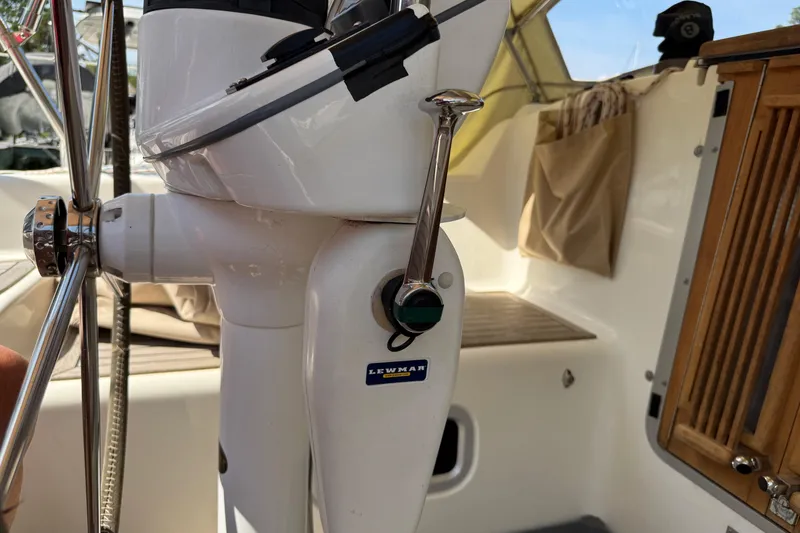 Slide: The Image of Steering wheel and controls of a 2006 Southerly 115 Mk IV sailboat cockpit. - 42