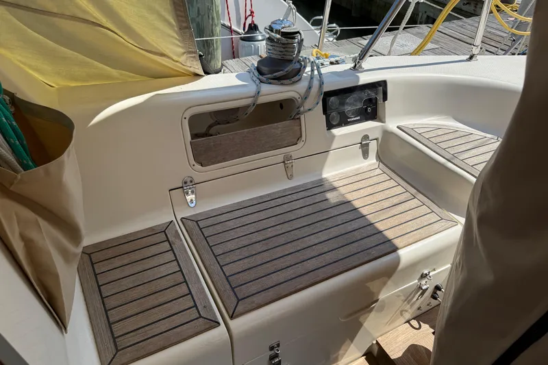 Slide: The Image of Cockpit of 2006 Southerly 115 Mk IV sailboat with wooden seating and nautical equipment. - 47