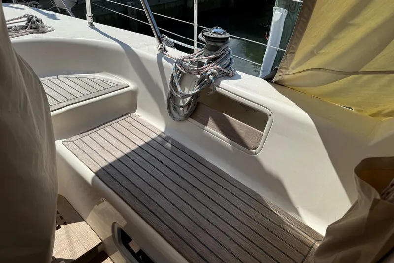 Slide: The Image of Cockpit of 2006 Southerly 115 Mk IV sailboat with wooden seating and winch. - 48