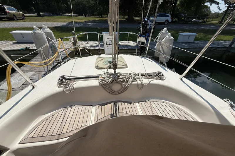 Slide: The Image of Southerly 115 Mk IV sailboat deck, 2006 model, docked with ropes and equipment. - 49