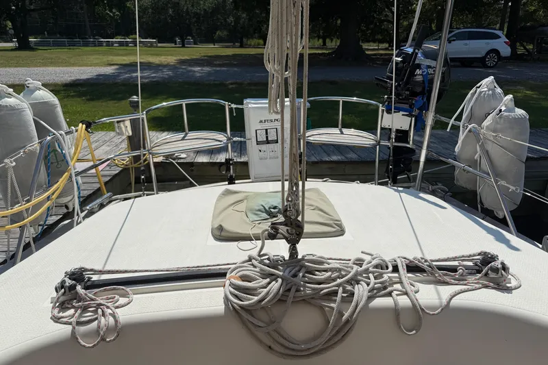 Slide: The Image of Deck view of 2006 Southerly 115 Mk IV sailboat with ropes and docked setting. - 50