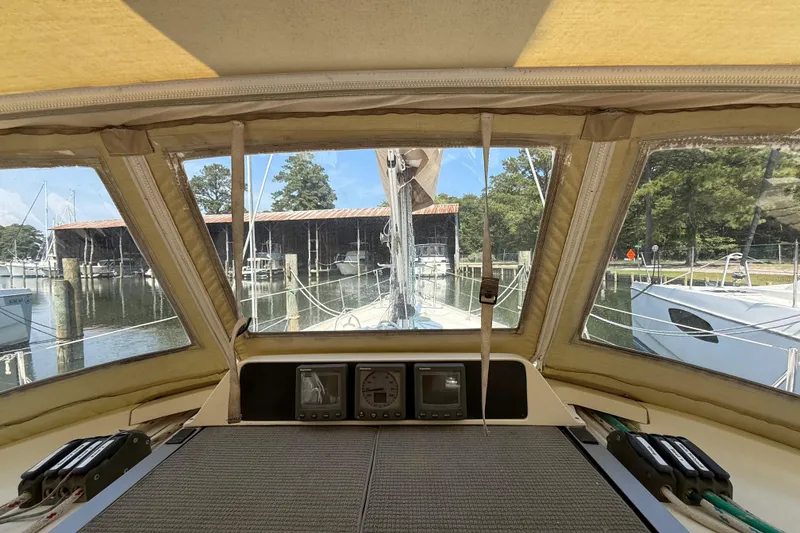 Slide: The Image of Interior view from a 2006 Southerly 115 Mk IV sailboat cockpit, docked at a marina. - 52