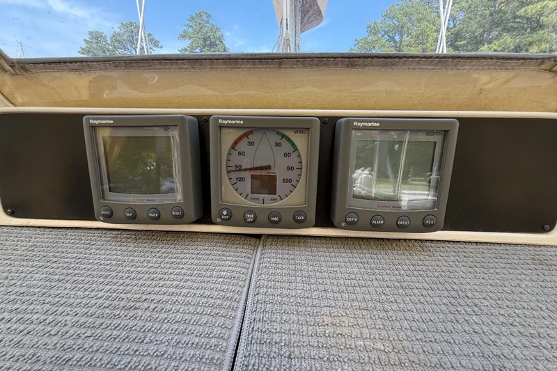 Slide: The Image of Raymarine instruments on a 2006 Southerly 115 Mk IV sailboat dashboard. - 53