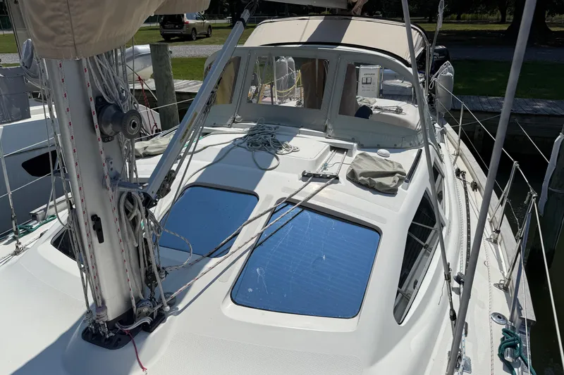 Slide: The Image of 2006 Southerly 115 Mk IV sailboat docked, featuring deck and rigging details. - 57