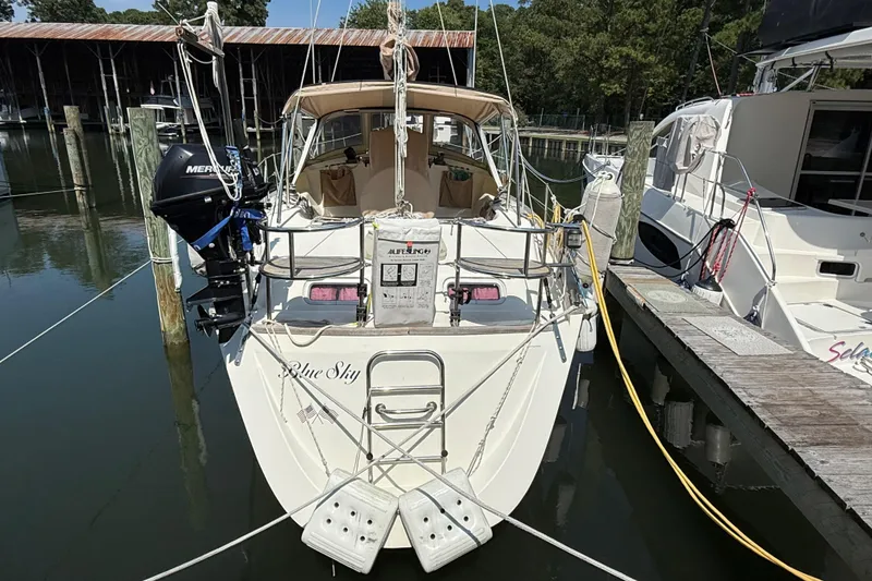 Slide: The Image of Sailboat "Blue Sky" docked, Southerly 115 Mk IV, 2006 model, with Mercury outboard motor. - 65