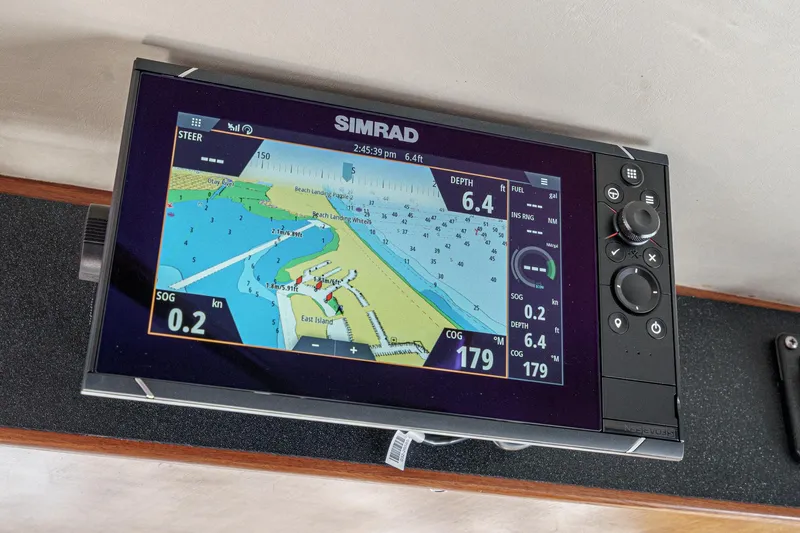 Slide: The Image of Simrad navigation system on 1986 Offshore Yachts 48 Yachtfisher, displaying nautical chart. - 6