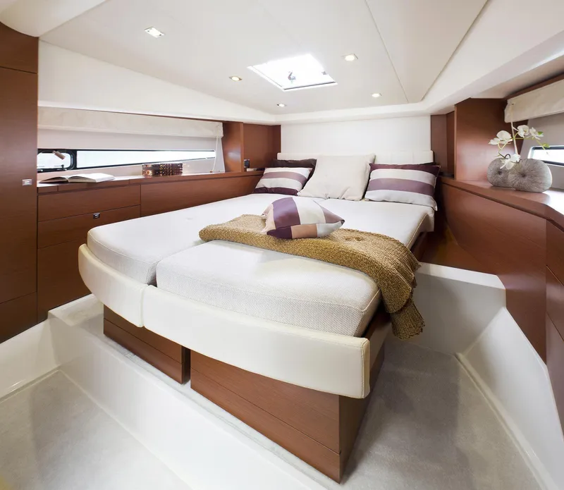 Slide: The Image of Luxurious interior of 2016 Prestige 450 S yacht with cozy bed and elegant decor. - 13
